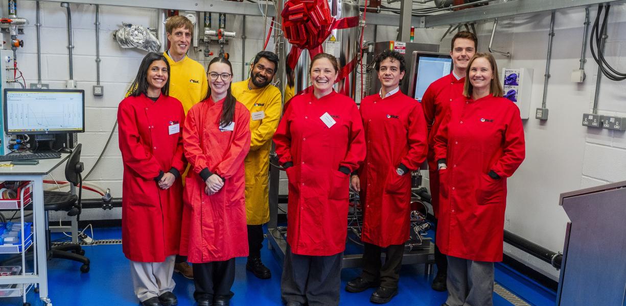 FlexBIO team by the fermenter