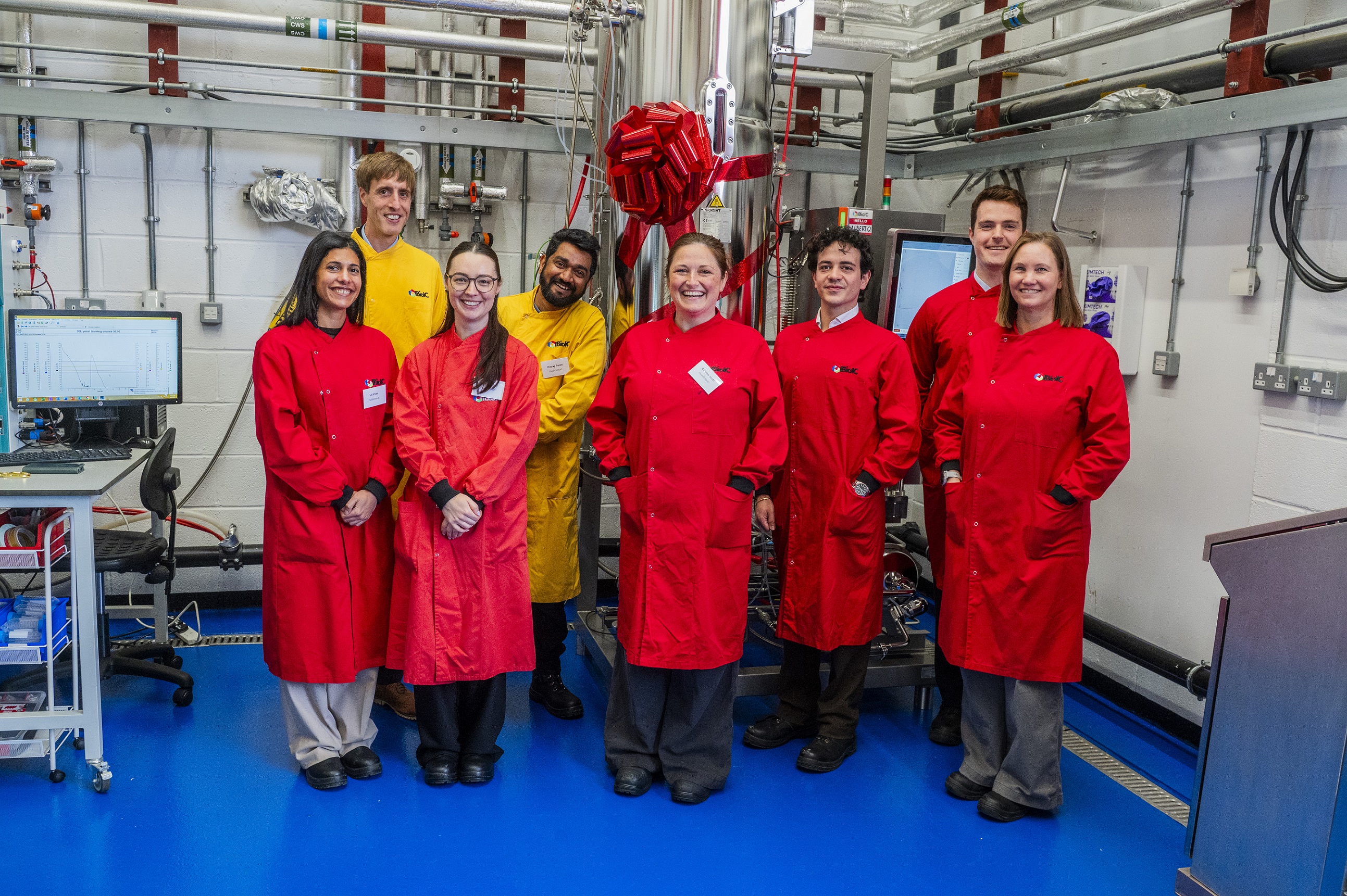 FlexBIO team by the fermenter